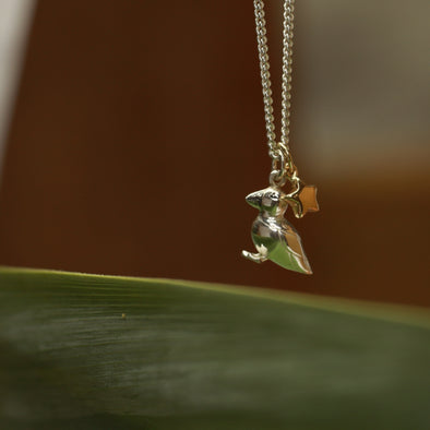 Puffin charm with gold star neckchain