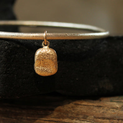 Bangle - silver - with a gold Tresco square pebble