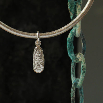 Bangle - silver - with a silver Agnes long pebble