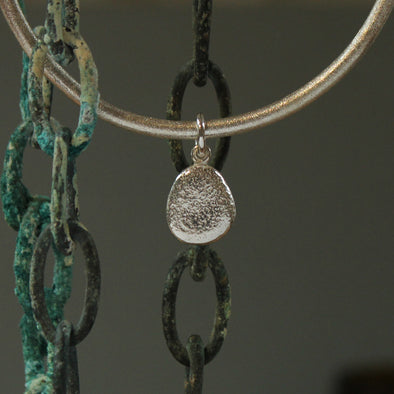 Bangle- silver - with a silver Bryher flat pebble